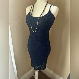 A black lace slip on dress… Pure fun, spaghetti straps, and size small